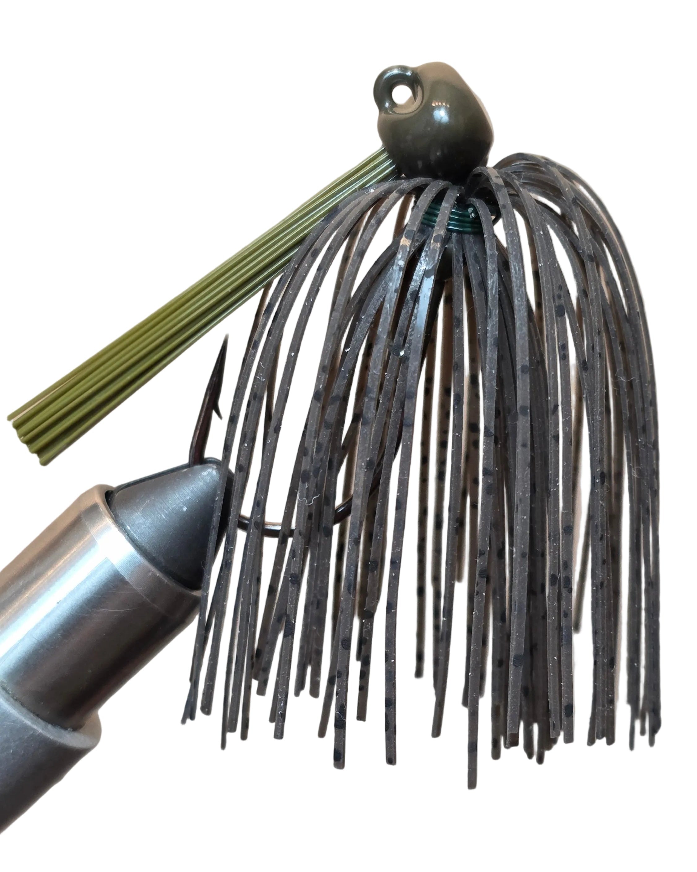 Fishing lure with green and black details on a white background