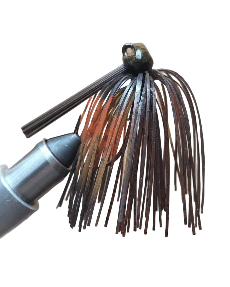 ragin cajun fishing lure with orange and black detail